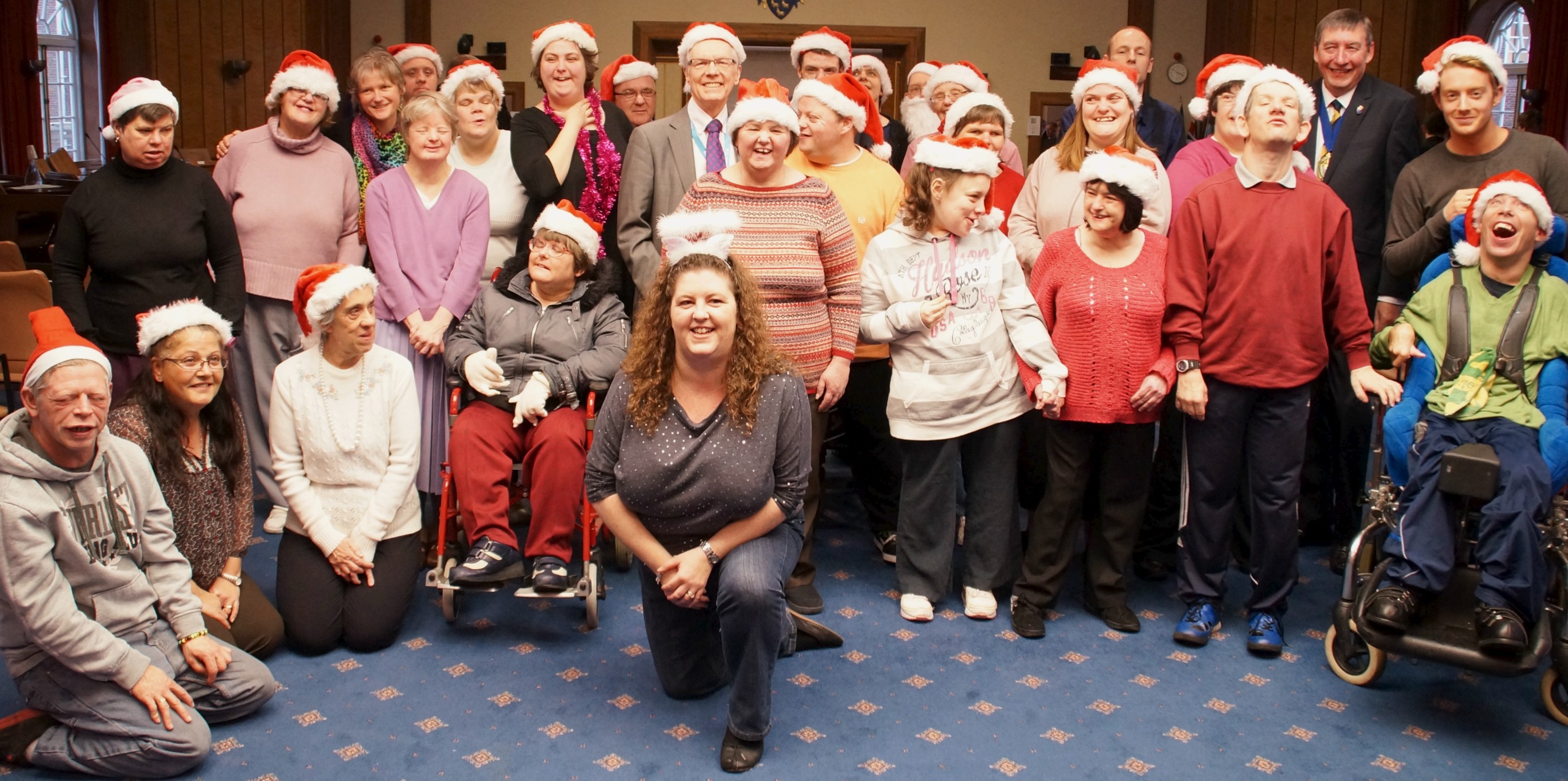 Adults with learning disabilities sing Merry Christmas to County Councillors